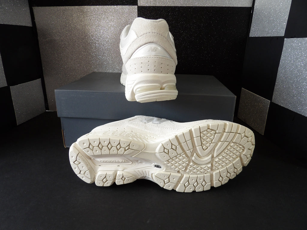 New Balance 2002R Lifestyle Sneakers – Triple White (Size US Men's 9.5 / Women's 11)
